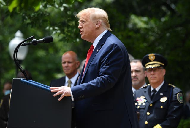 Donald Trump speaks at an event to sign an executive order on police reform in the Rose Garden of the White House