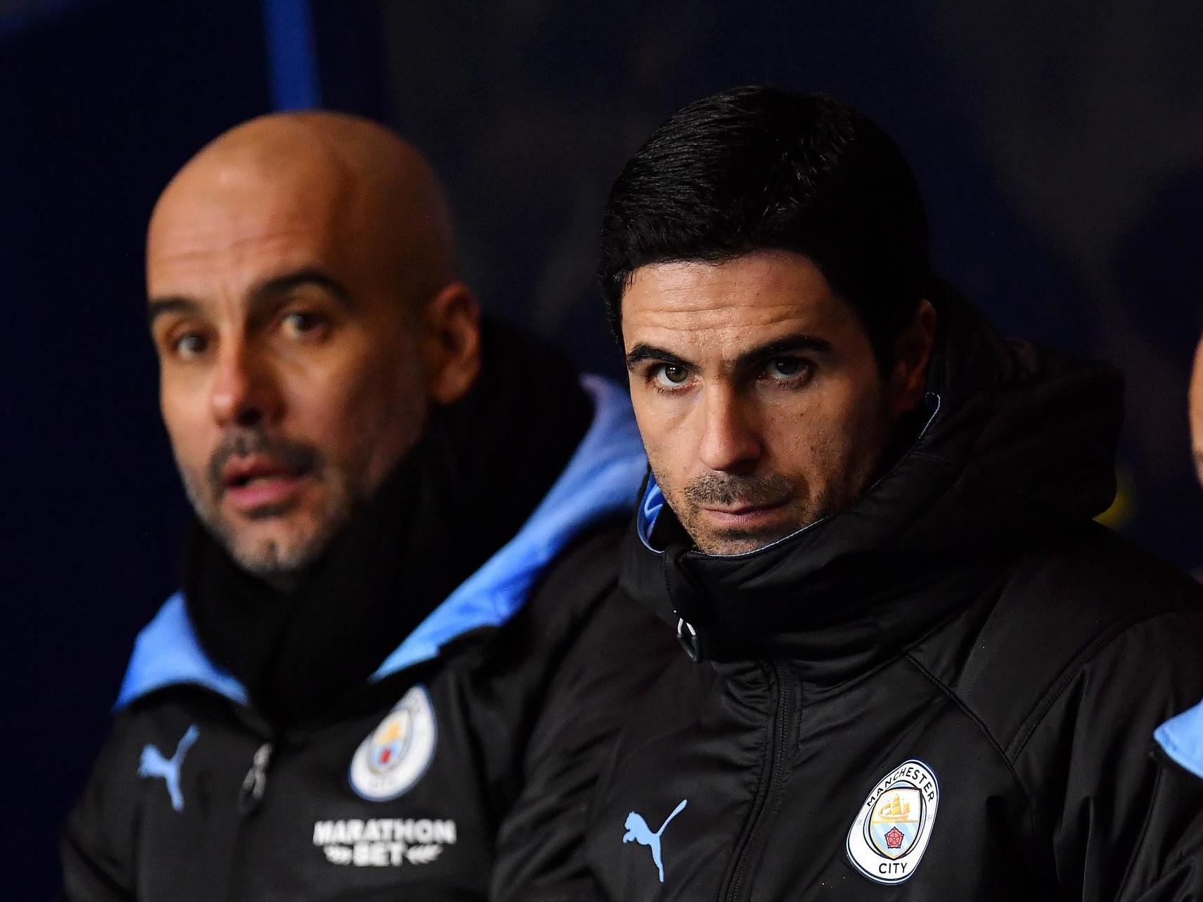 Manchester City manager Pep Guardiola and former assistant Mikel Arteta