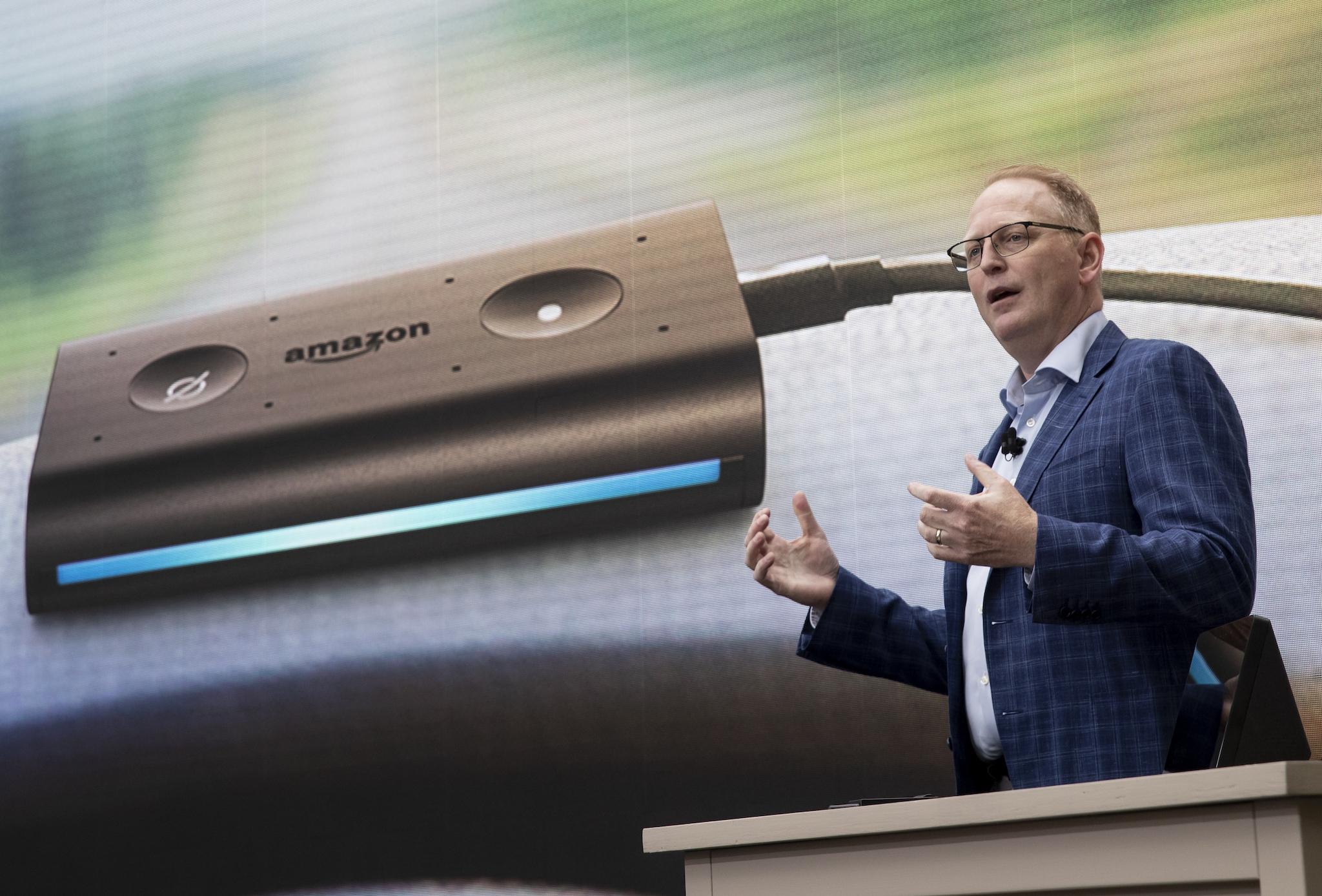 Dave Limp, Senior Vice President of Amazon Devices, introduces the "Echo Auto,' which allows users to use Alexa in their car, during an event at the Amazon Spheres, on September 20, 2018 in Seattle Washington