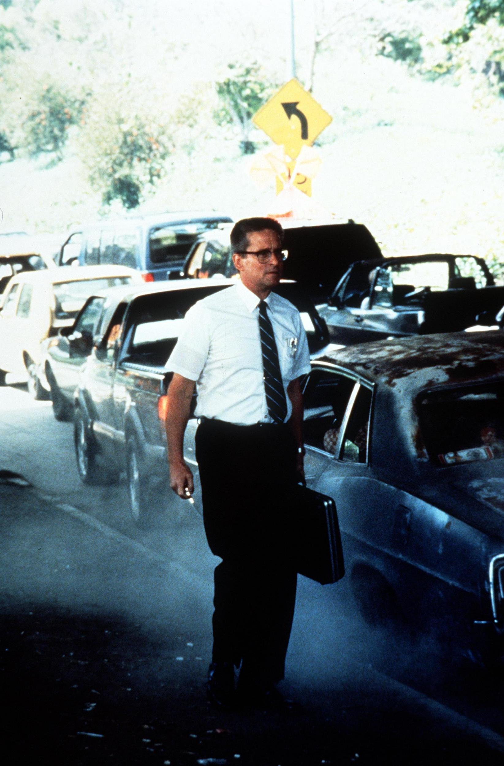 Michael Douglas as William “D-Fens” Foster simply abandons his car in ‘Falling Down’ (1993) after being irritated by other drivers