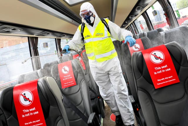 New normal: 'fogging' anti-viral treatment on a National Express coach