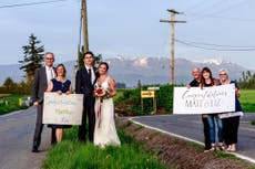 Cross-border couples from US and Canada meeting along border to marry