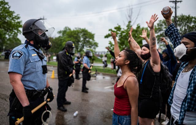 Protesters and police in Minneapolis. Star Tribune/AP