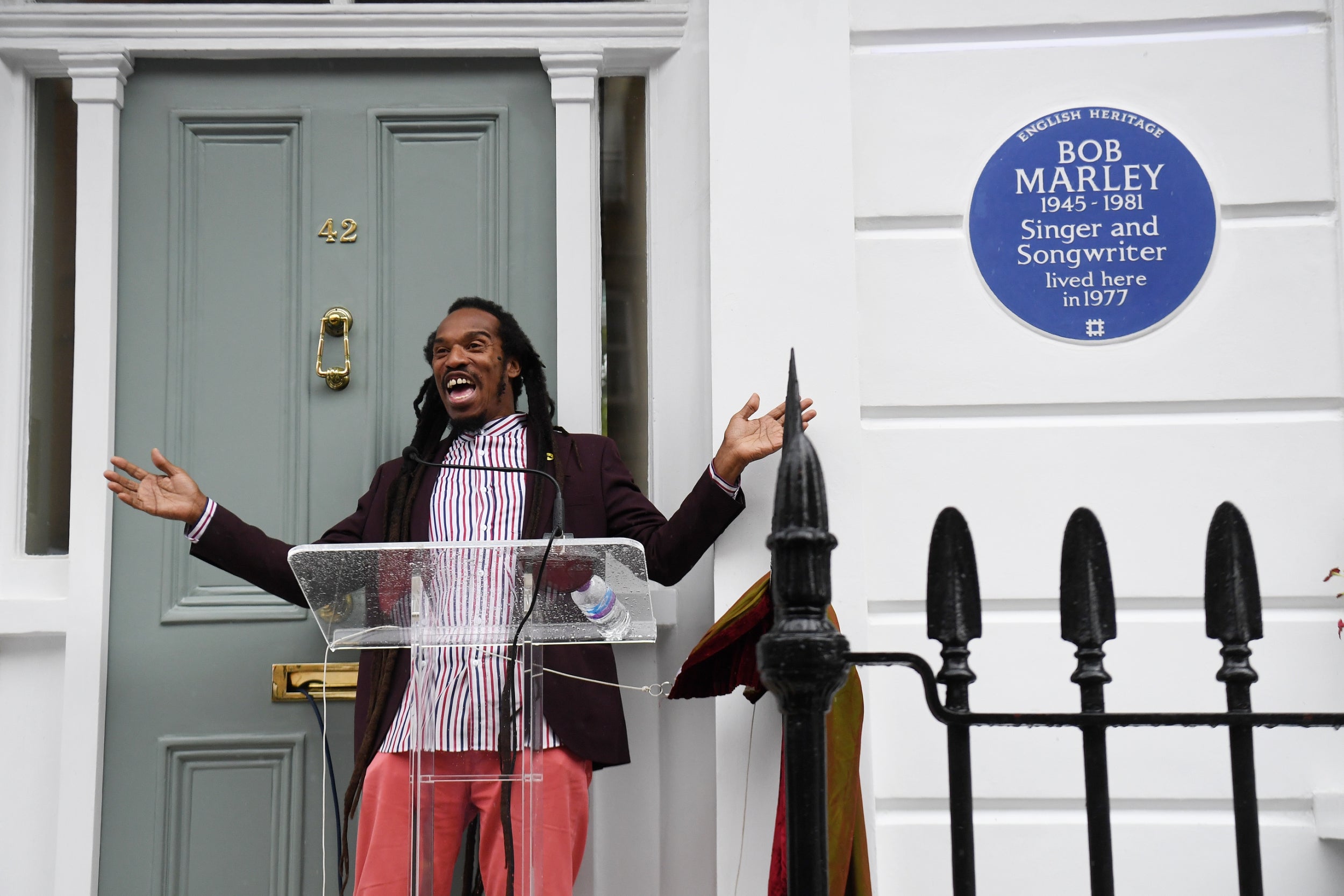 Poet Benjamin Zephaniah unveils an English Heritage blue plague for Bob Marley at his home on Oakley Street in Battersea, London