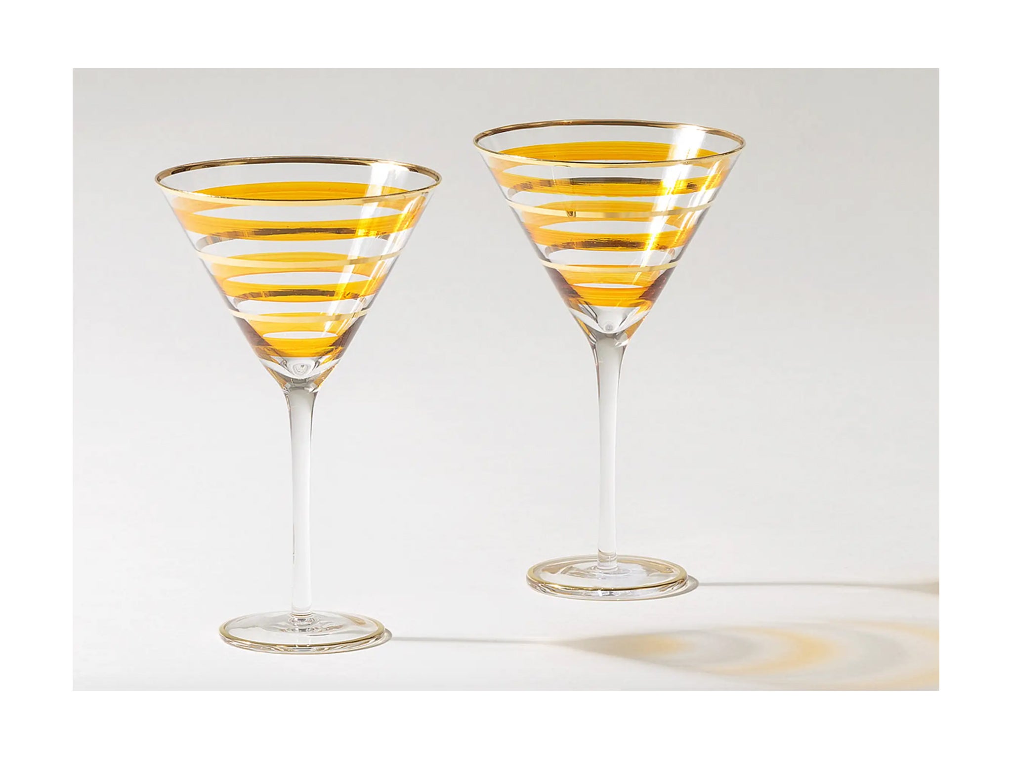 Sit back and relax with your new-found martini making skills with this stylish set of glassware