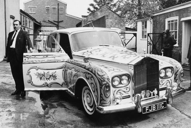 Anthony stands next to John Lennon's custom-built Rolls-Royce Phantom V in 1967