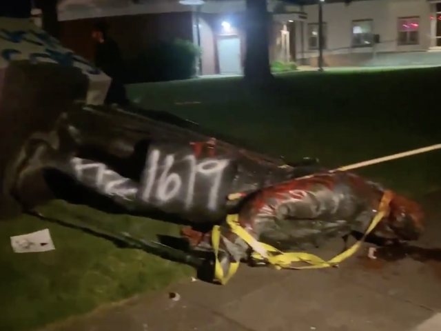 Protesters tore down the statue on Thursday evening, and it was covered with graffiti 