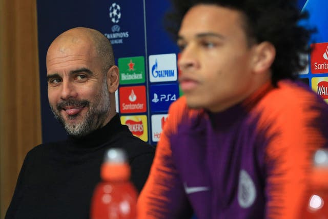 Manchester City manager Pep Guardiola and winger Leroy Sané