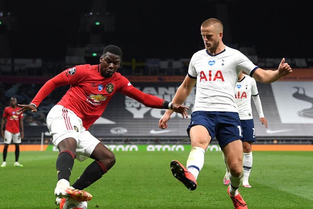 Pogba, moments before drawing a foul from Eric Dier, right