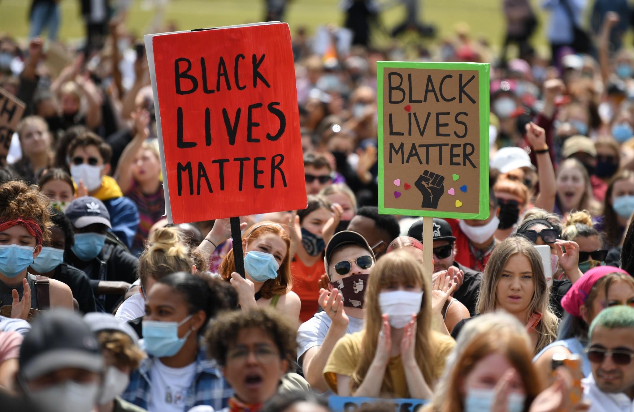 Activists attend a Black Lives Matter protest in Hyde Park in London on Saturday