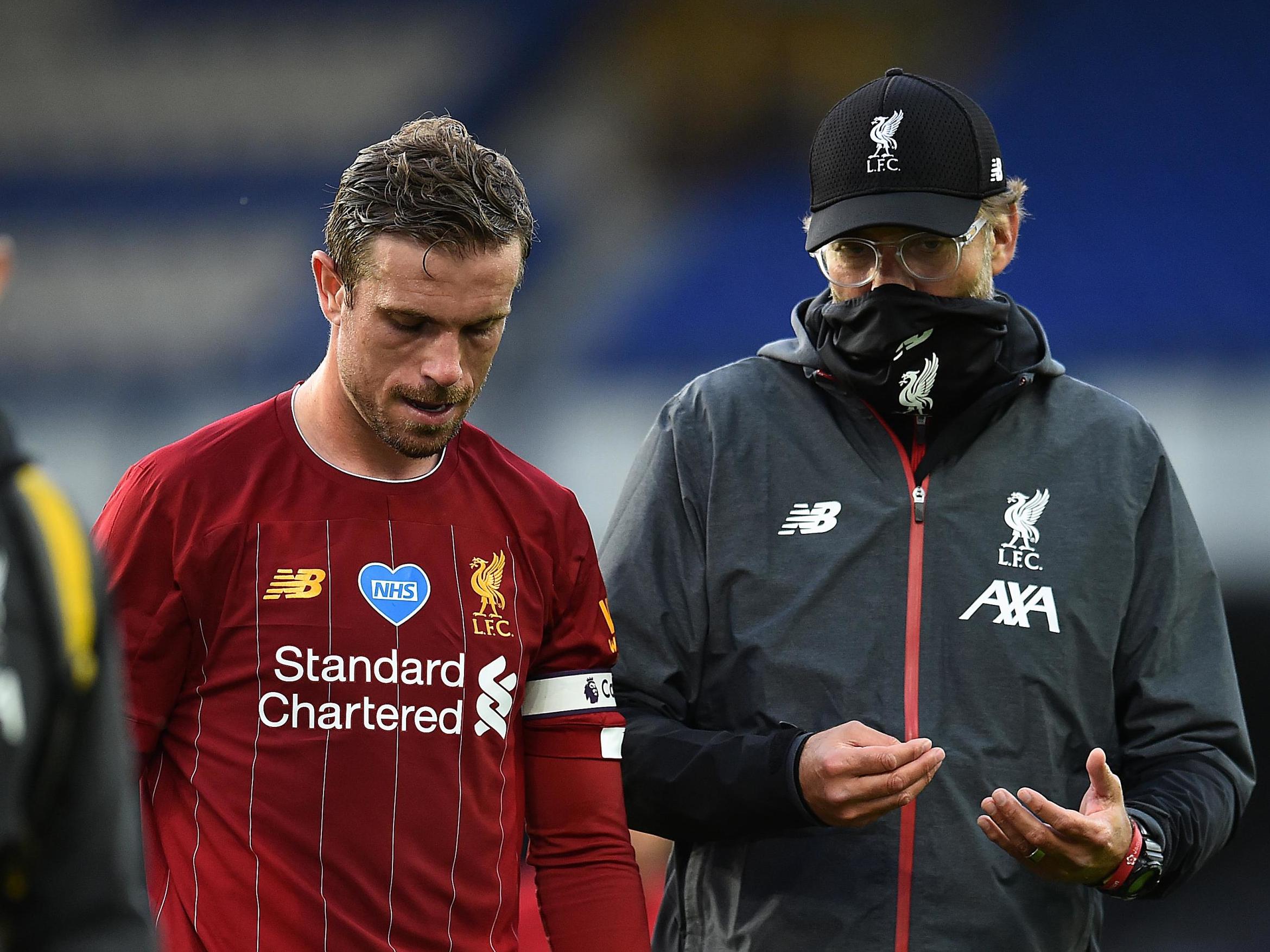 Jordan Henderson with Liverpool coach Jurgen Klopp