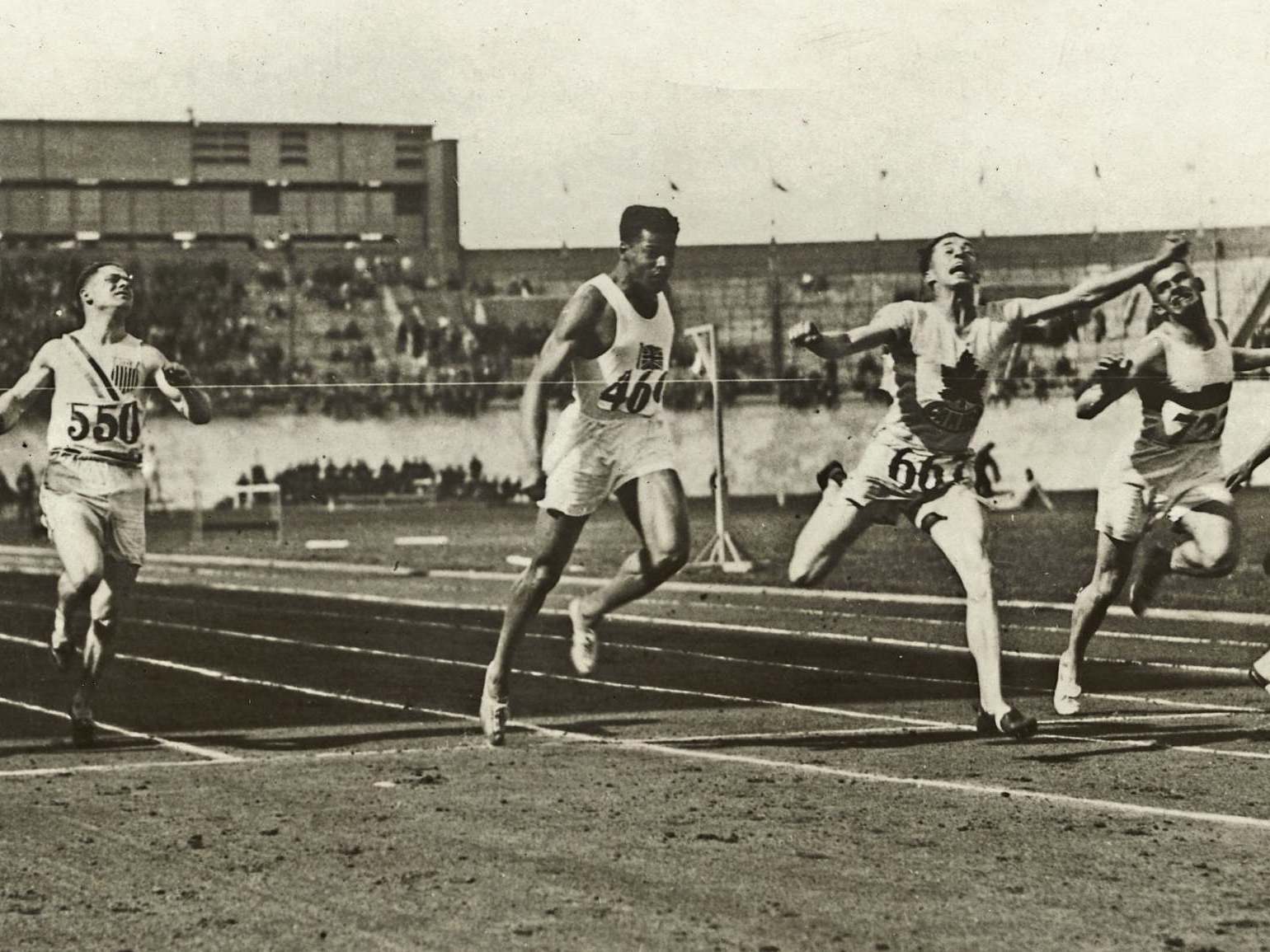 London (second from left) in the 100m at the 1928 Amsterdam Olympics