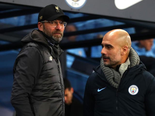 Liverpool coach Jurgen Klopp (left) and Man City's Pep Guardiola