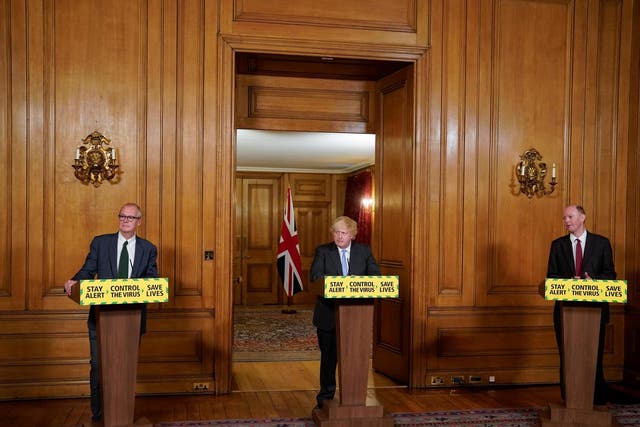 Britain's Prime Minister Boris Johnson, Chief Medical Officer Professor Chris Whitty and Chief Scientific Adviser Sir Patrick Vallance attend the last daily coronavirus briefing on 23 June, 2020.