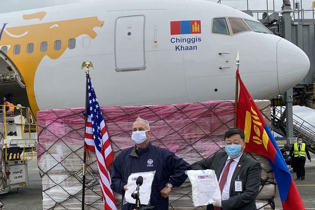 FEMA official Michael O’Hare accepts donation from Mongolian ambassador Yondon Otgonbayar