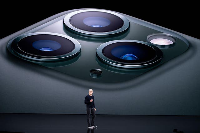 Apple CEO Tim Cook speaks on-stage during a product launch event at Apple's headquarters in Cupertino, California on September 10, 2019