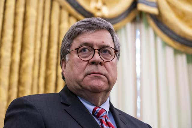 WASHINGTON, DC - MAY 28: Attorney General William Barr listens as U.S. President Donald Trump speaks in the Oval Office before signing an executive order related to regulating social media on May 28, 2020 in Washington, DC. Trump's executive order could lead to attempts to punish companies such as Twitter and Google for attempting to point out factual inconsistencies in social media posts by politicians.