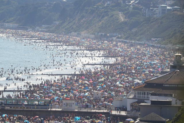 The scene on the beach in Bournemouth, Dorset, after the UK officially recorded its warmest day of the year so far when the temperature reached 32.6C