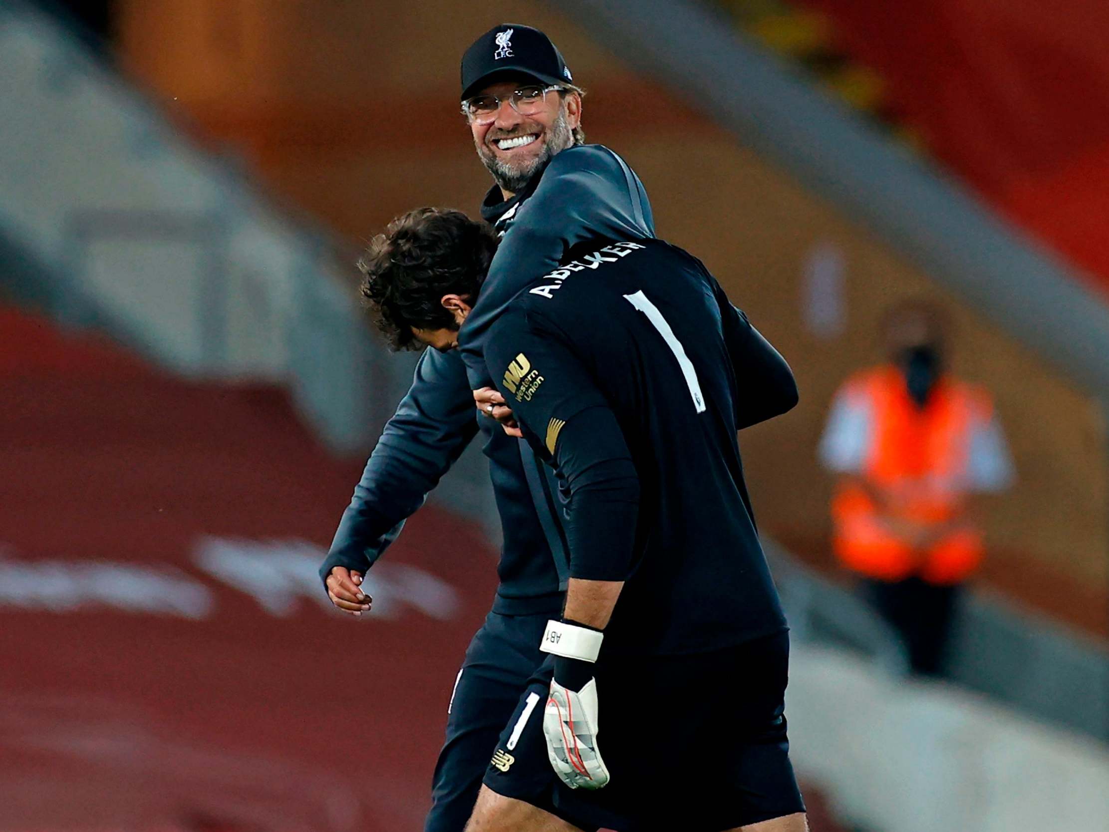 Jurgen Klopp celebrates with Alisson after the 4-0 thrashing of Crystal Palace
