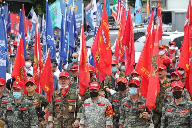 Veterans and conservative activists rally in southern Seoul, South Korea on Thursday to mark the 70th anniversary of the outbreak of the Korean War