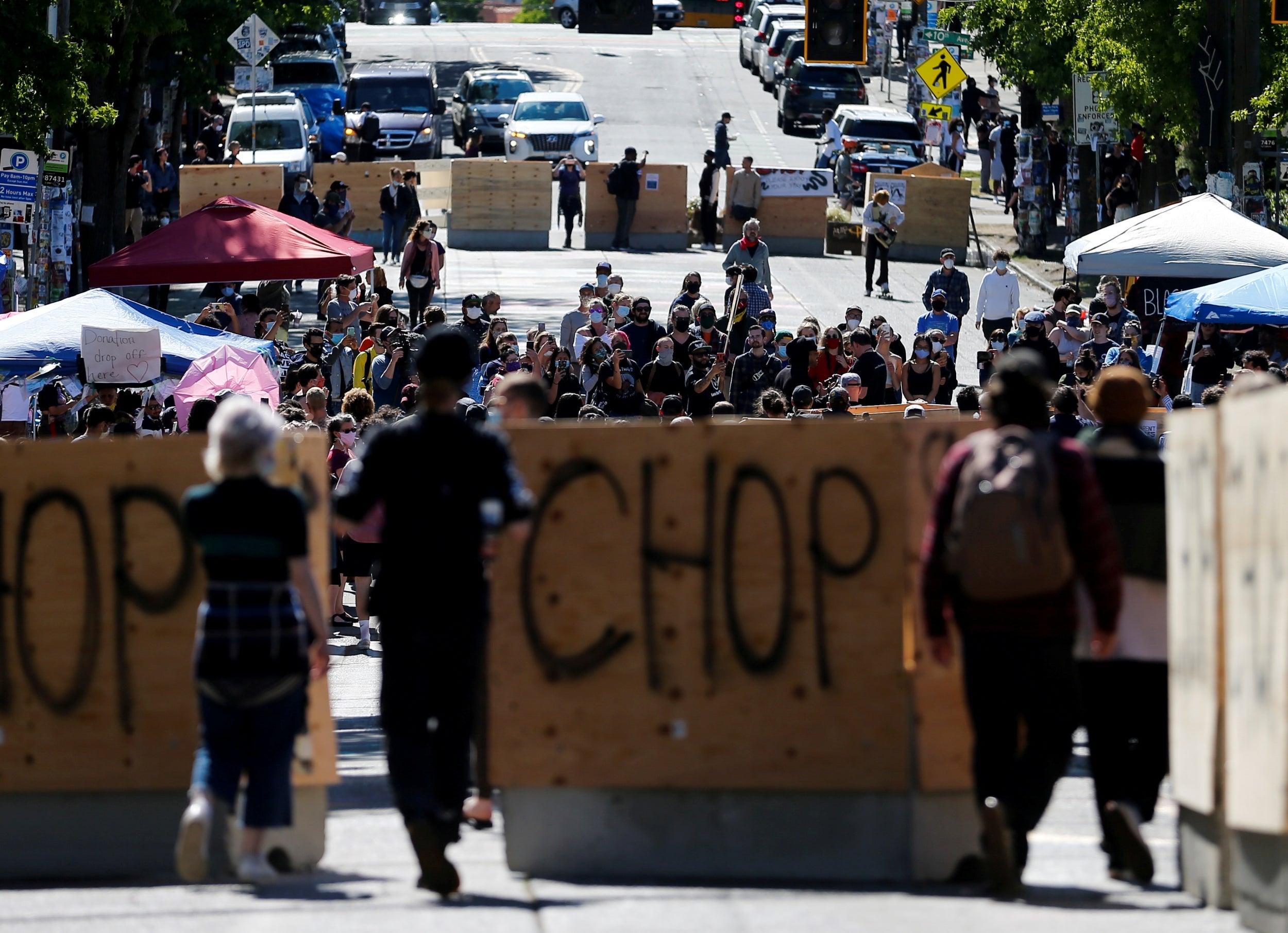 Protesters demonstrating against racial inequality occupy space at the CHOP area near the police department’s East Precinct