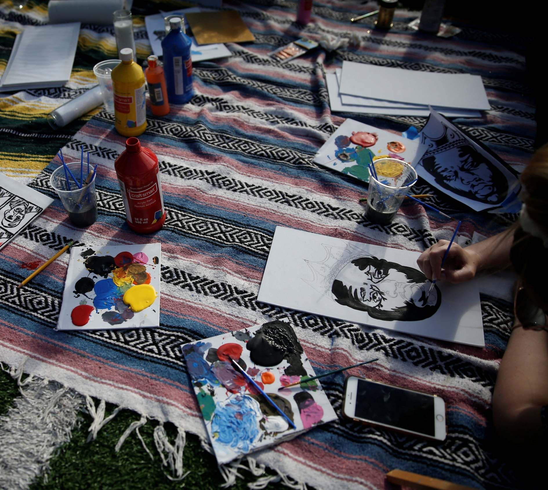 Free painting stations and other community activities have popped up on the streets