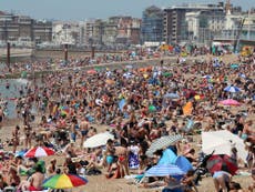 Beaches and parks packed with people – and litter – as thousands defy lockdown to enjoy hottest day of the year