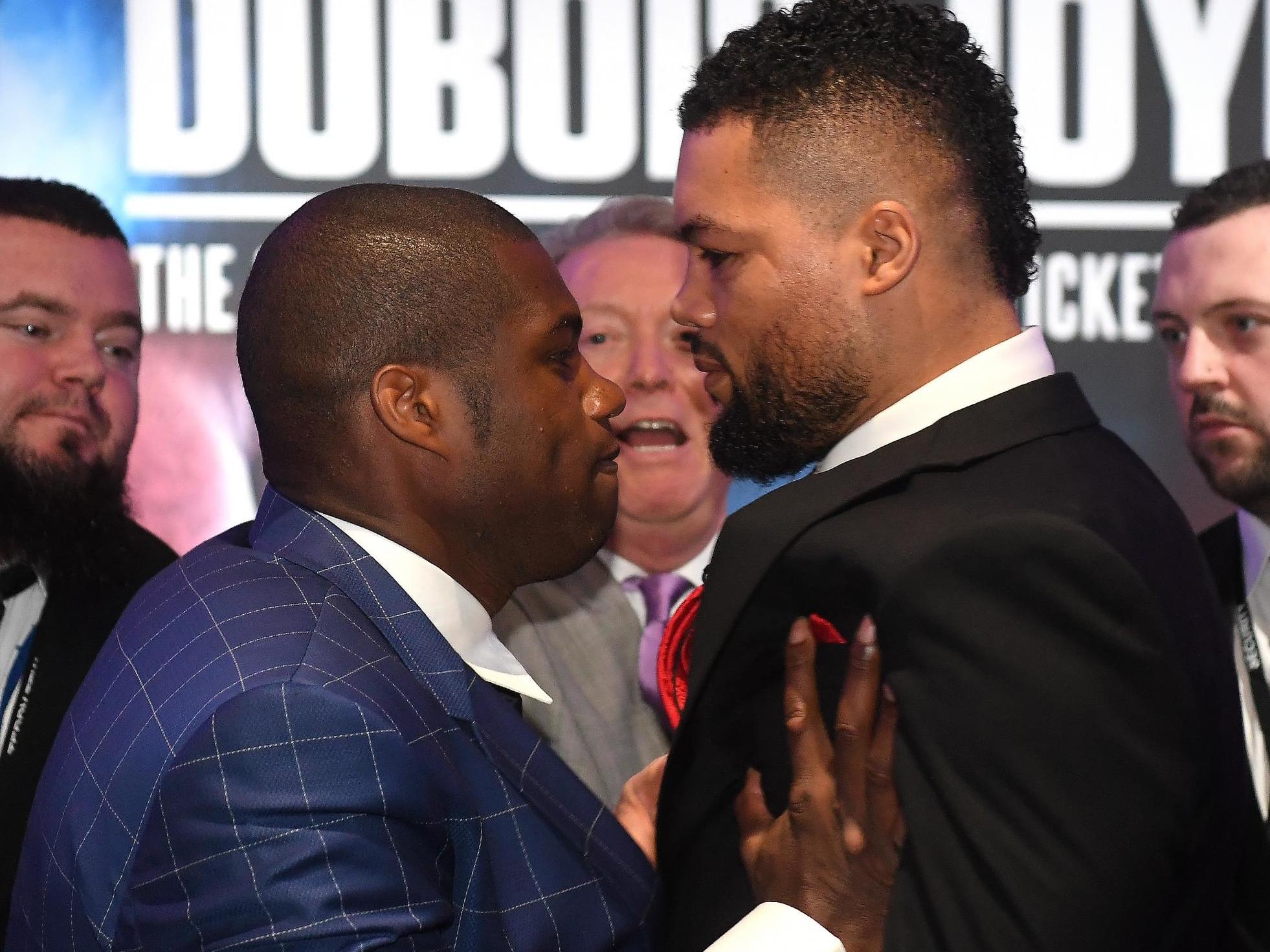 Daniel Dubois (centre left) and Joe Joyce (centre right) at a press conference in February (Getty)