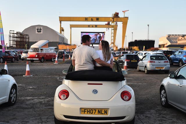 Movie goers watch ‘Grease’ on the big screen in the Titanic Quarter in Belfast