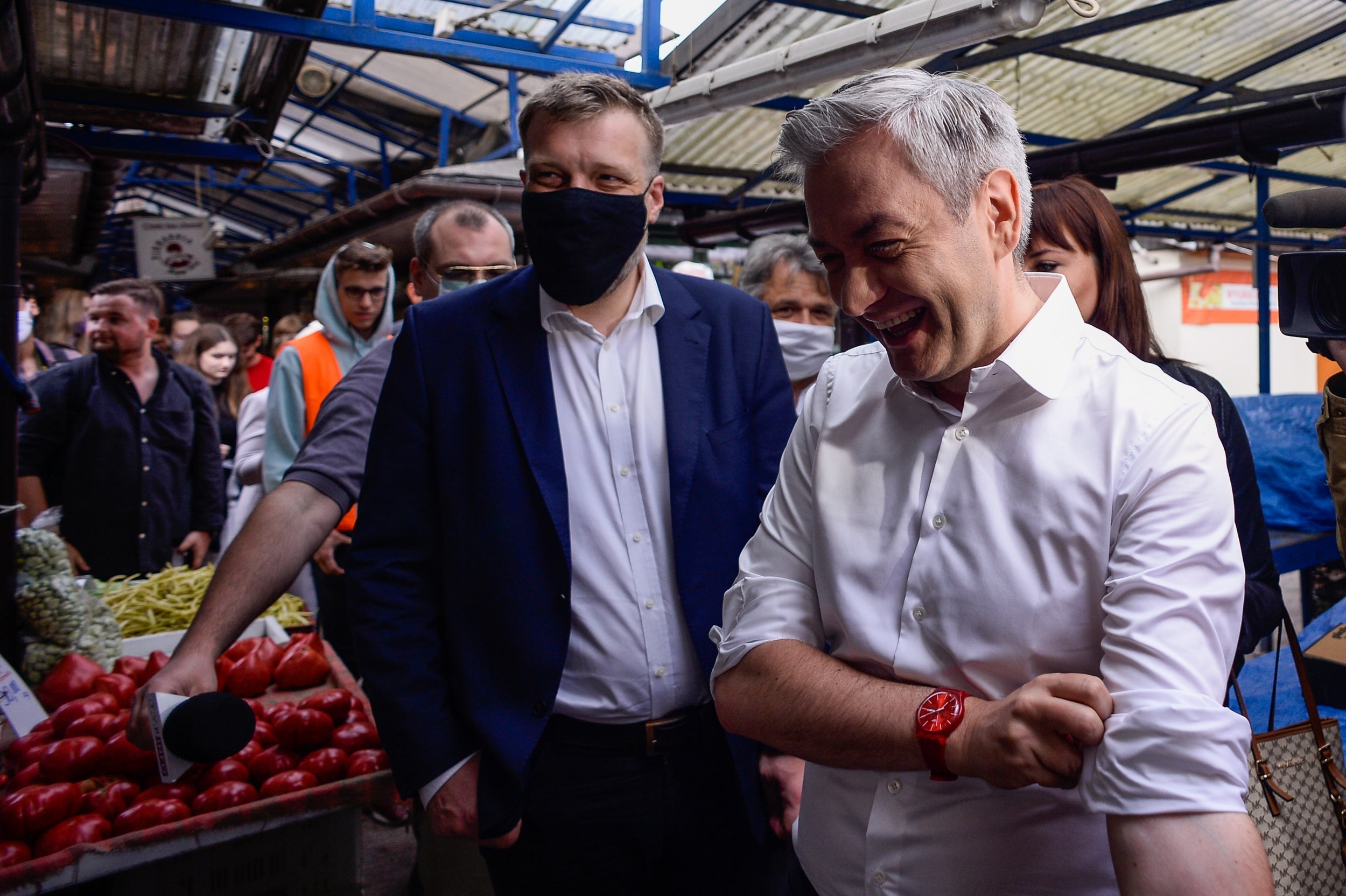 Robert Biedron visits an open air market during the last day of campaigning on Friday for Sunday’s presidential elections in Krakow, Poland (Getty)