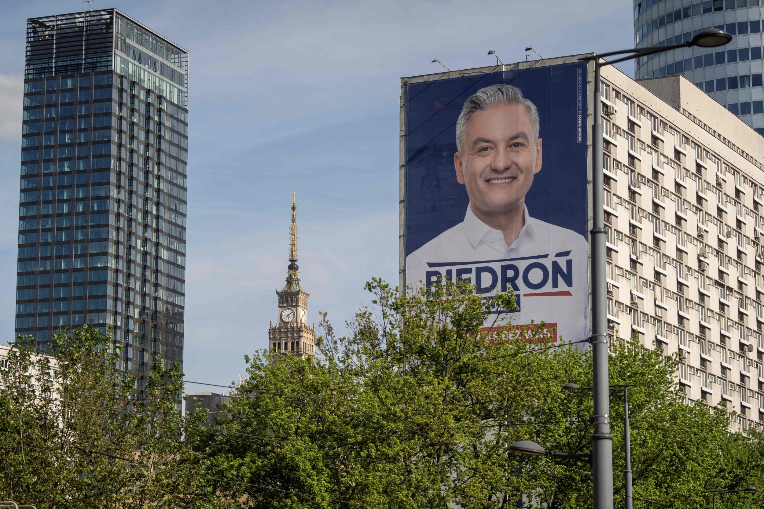 A picture taken on Thursday shows a huge election poster of left-wing presidential candidate Robert Biedron in downtown Warsaw