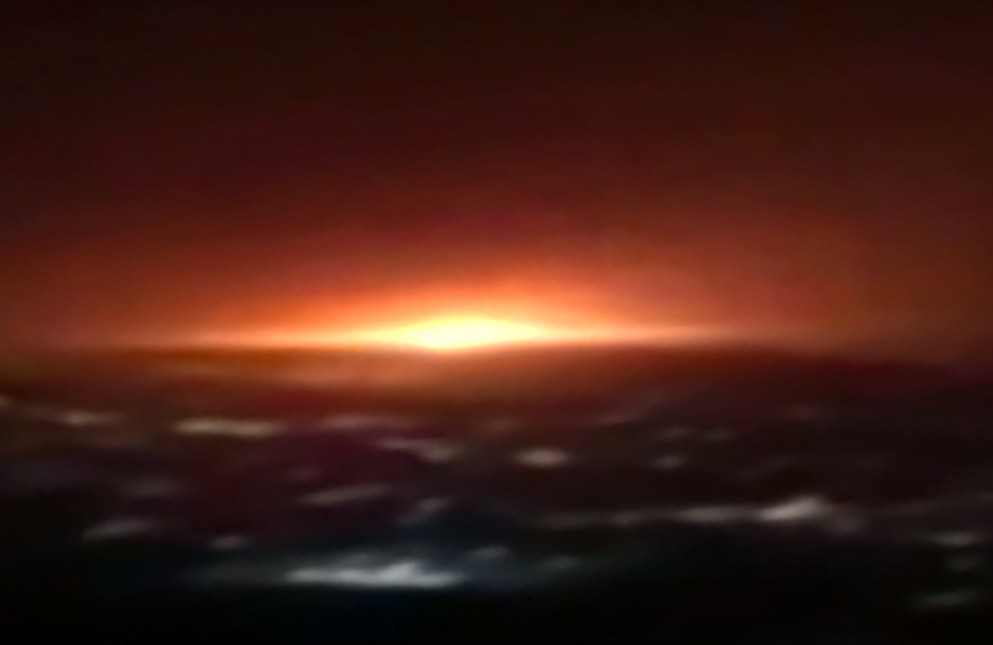 An image grab from footage obtained from Iranian State TV IRIB shows an orange light, resulting from what the country's defence ministry said, the explosion of a gas tank in the Iranian capital Tehran