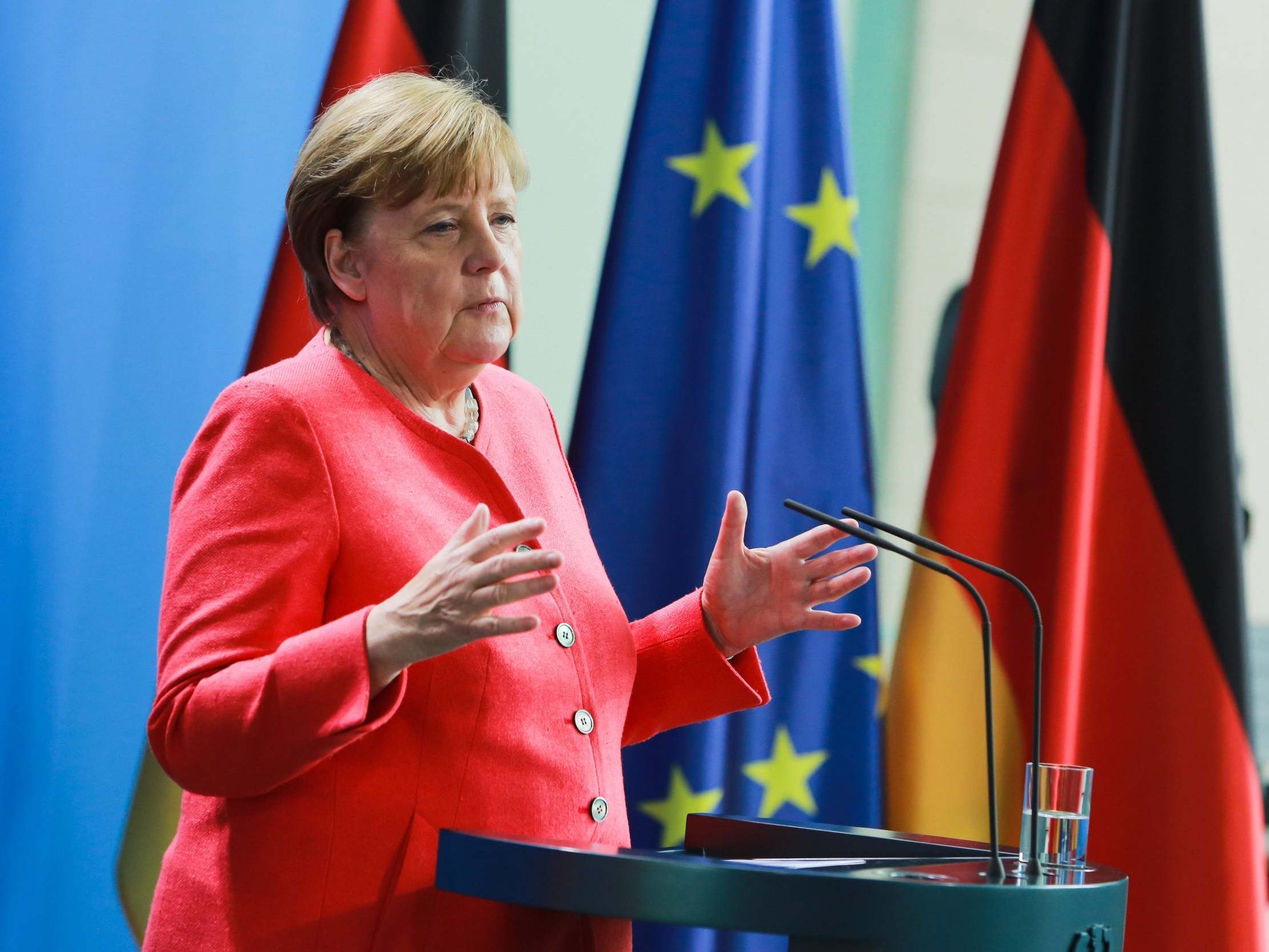 Angela Merkel speaks to the media following a videoconference with the European Council on 19 June