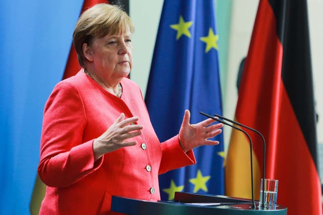 Angela Merkel speaks to the media following a videoconference with the European Council on 19 June