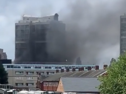 Thick smoke rising into the sky in south London from the blazing tower block