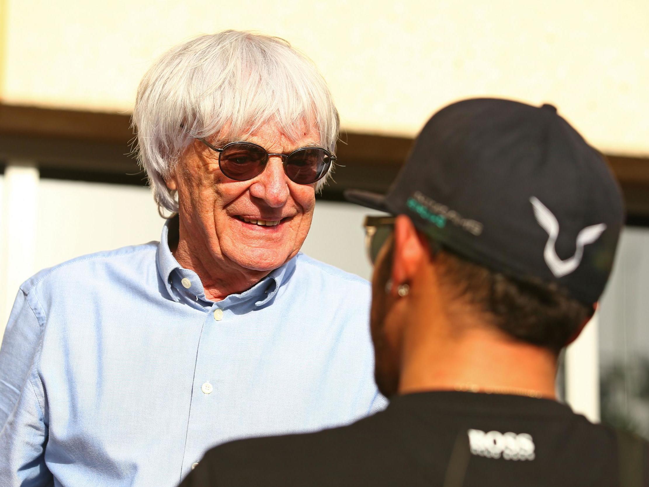 Bernie Ecclestone talks to Lewis Hamilton at the Bahrain GP in 2015