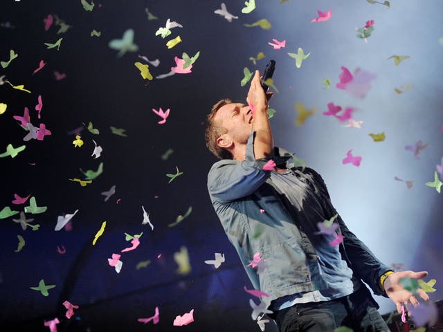 Coldplay frontman Chris Martin performing on the Pyramid Stage, Glastonbury 2011