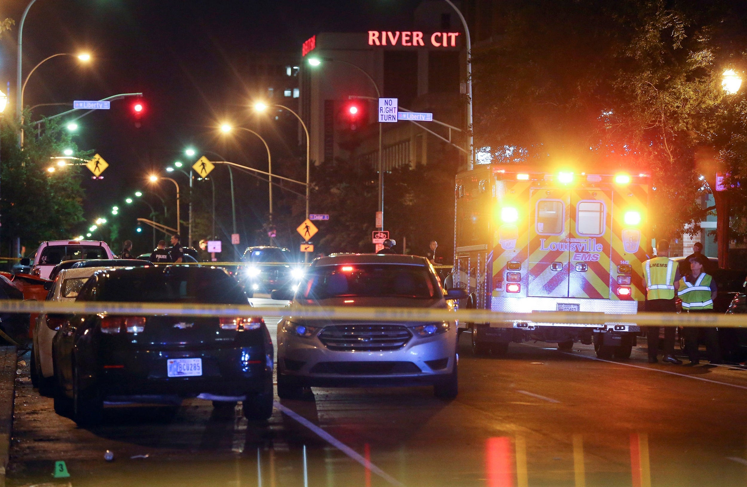 Louisville police block off the scene of the shooting at a protest over the death of Breonna Taylor