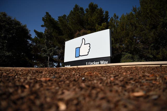 The Facebook "like" sign is seen at Facebook's corporate headquarters campus in Menlo Park, California, on October 23, 2019