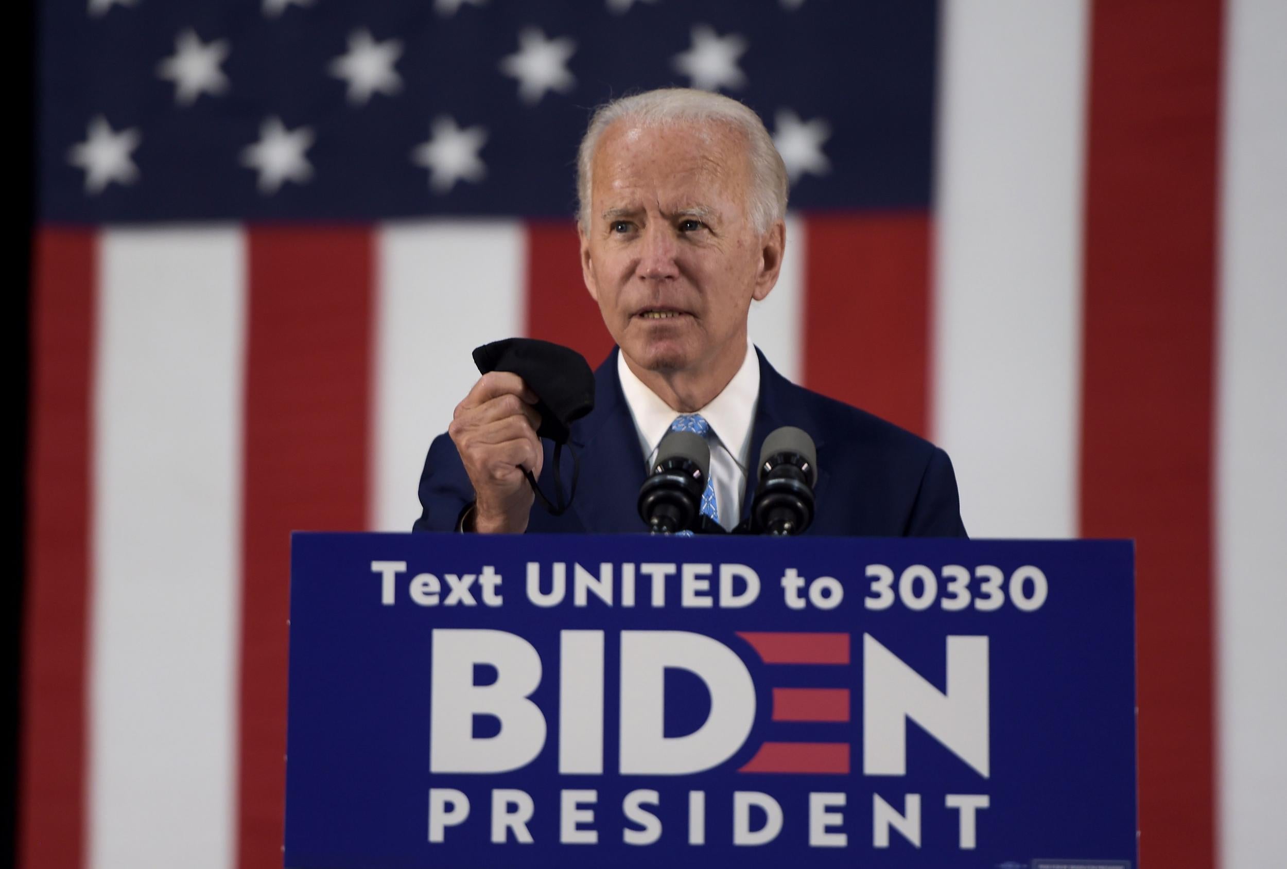 Joe Biden invokes his late son's military service as he suggests Trump 'unfit to be president' over Russia claims
