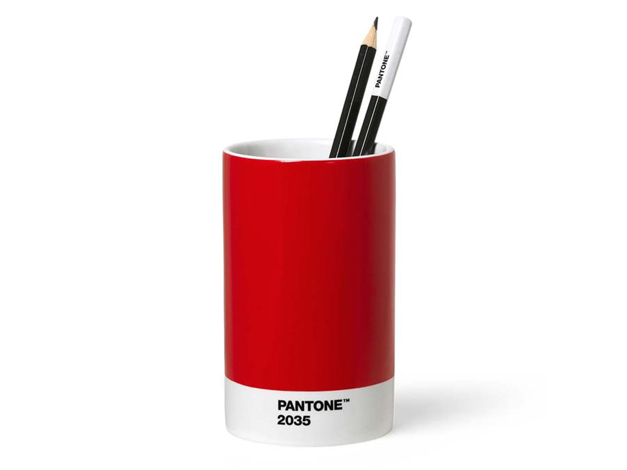 Introduce some colour into your workspace with stationary pieces such as this pen pot