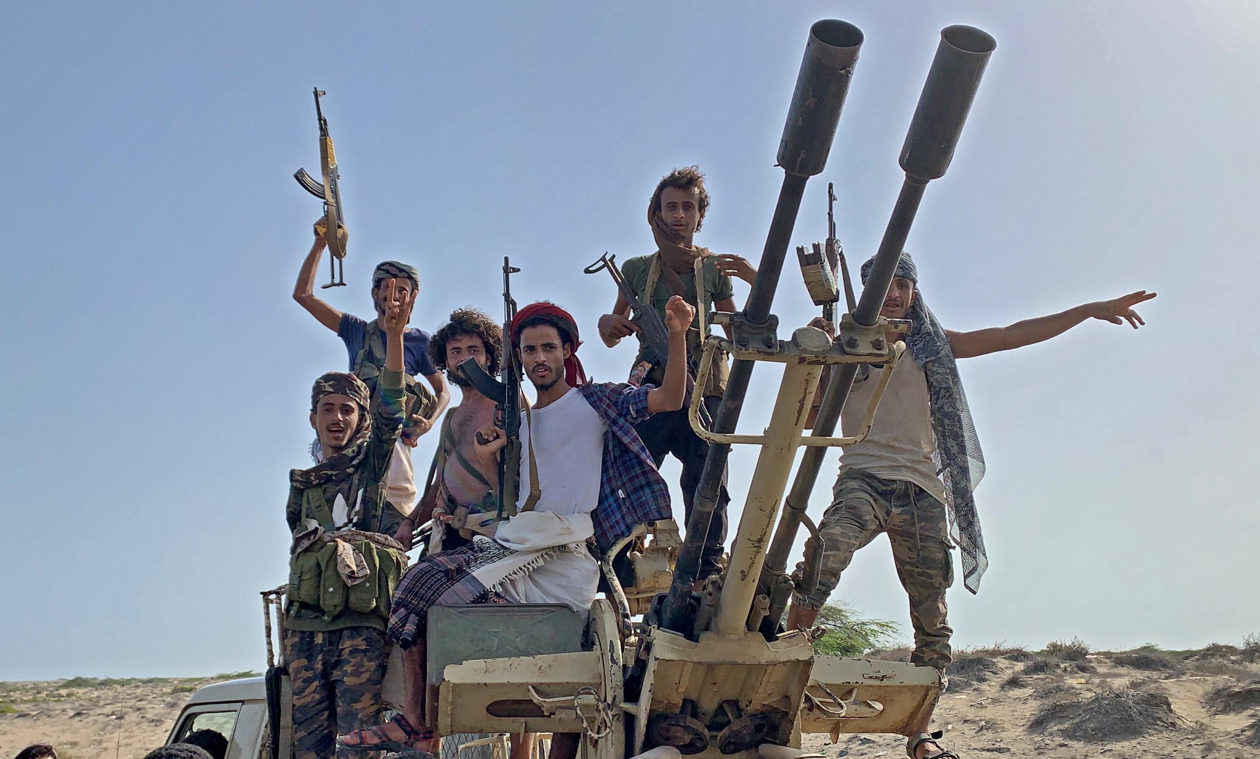 Fighters loyal to Yemen's Southern Transitional Council (STC) during clashes with pro-government forces for control of Zinjibar, the capital of the southern Abyan province