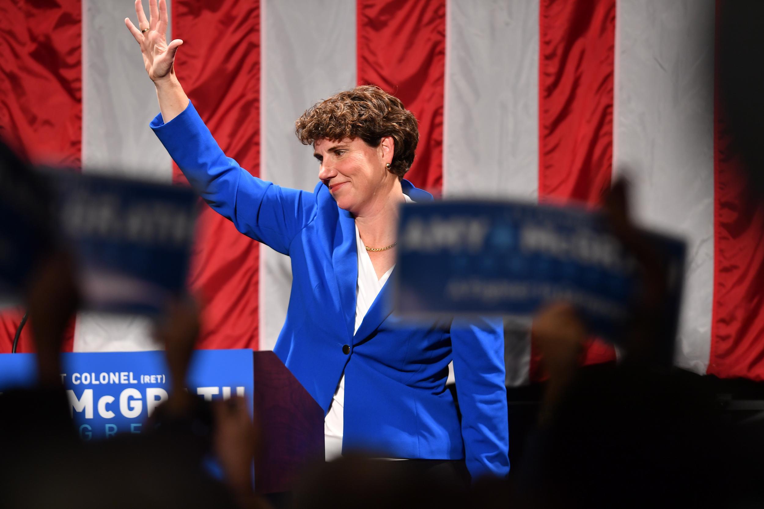 Amy McGrath scored a narrow victory over Charles Booker today