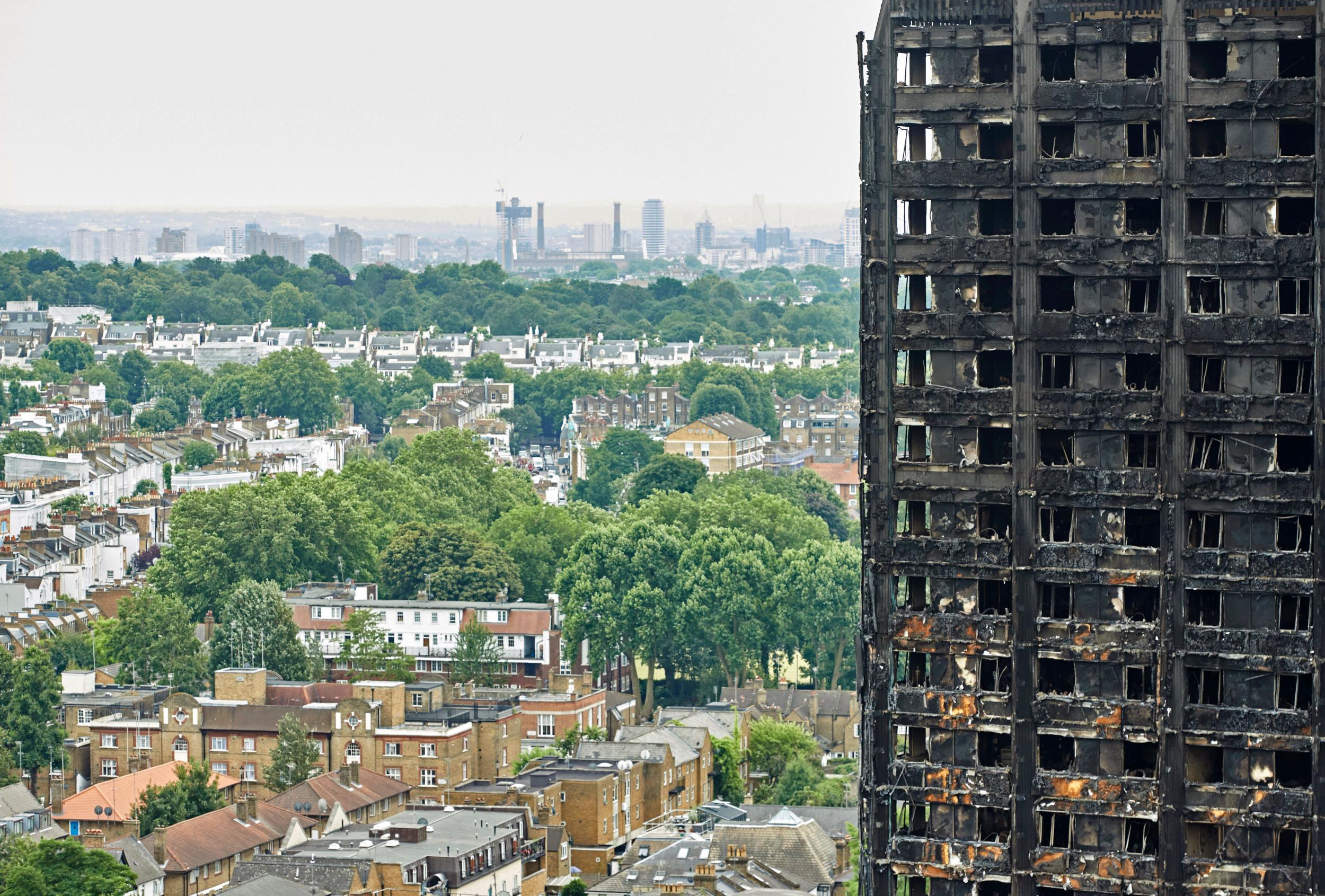 The charred remains of the burnt-out shell of the Grenfell Tower block in north Kensington