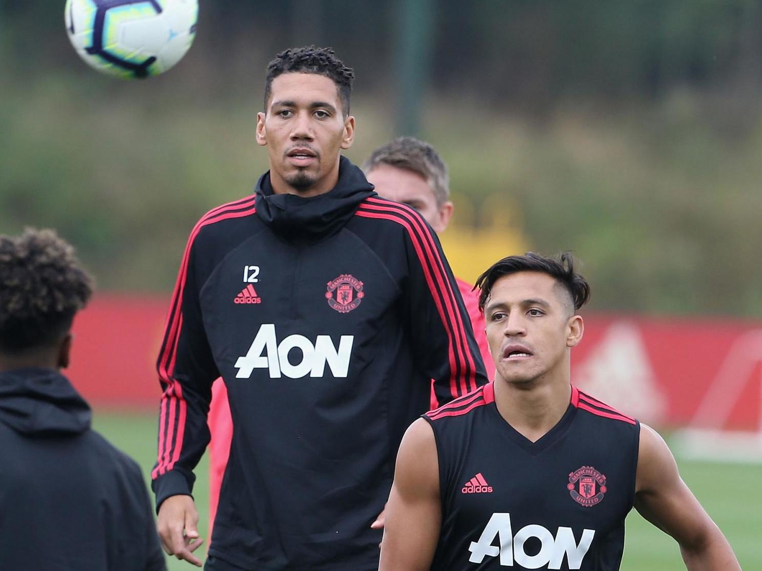 Chris Smalling (left) and Alexis Sanchez were loaned to Serie A sides last summer