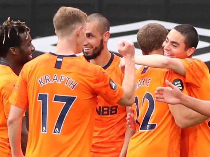 Newcastle celebrate Miguel Almiron scoring their third goal at Bournemouth