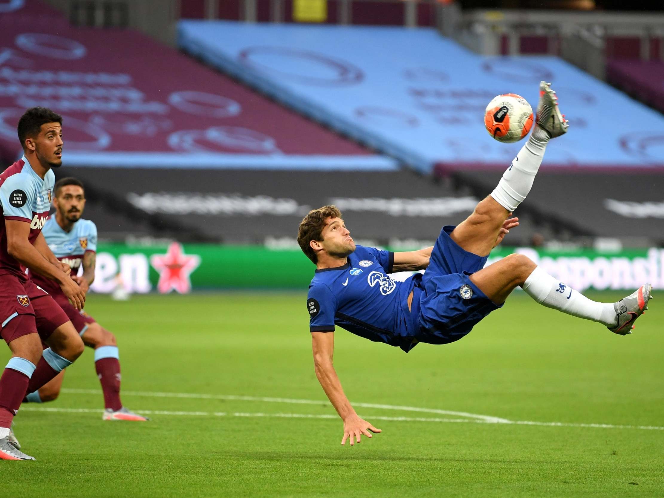 Marcos Alonso attempts and overhead kick at goal