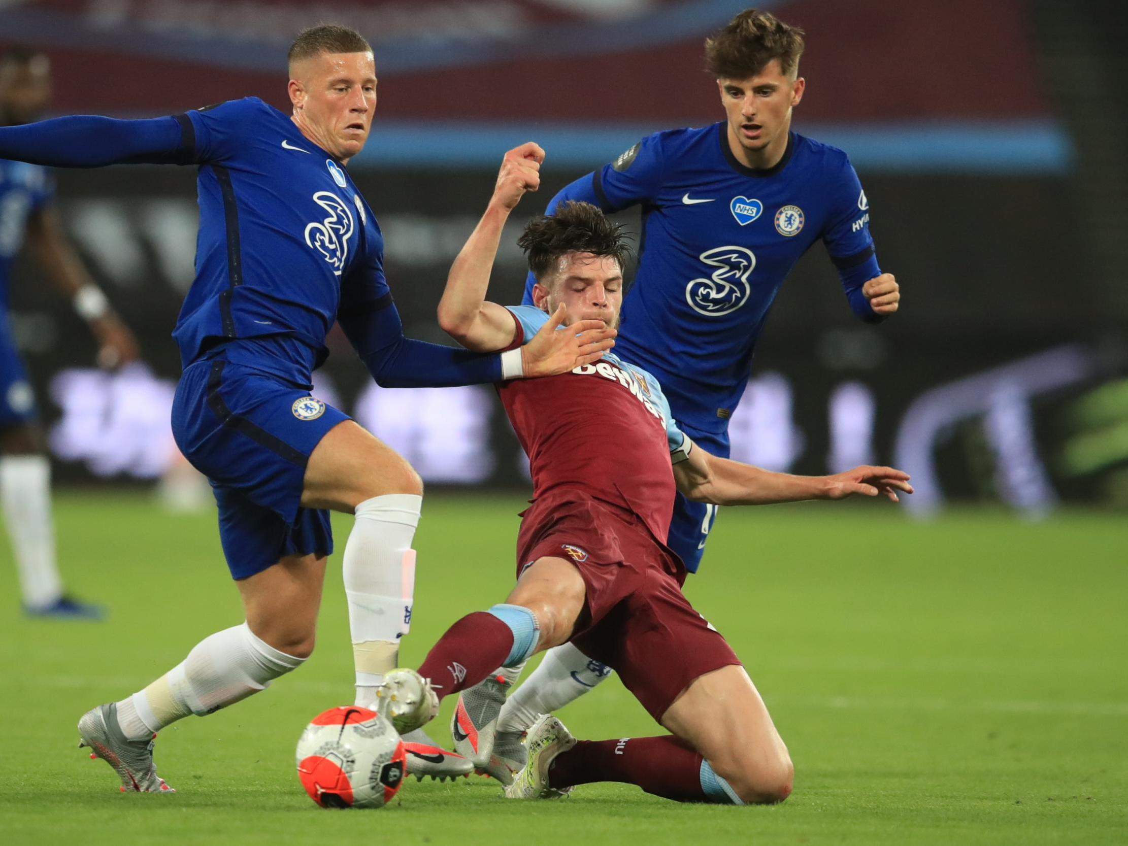 Declan Rice is challenged by Chelsea's Ross Barkley (left) and Mason Mount (Getty)