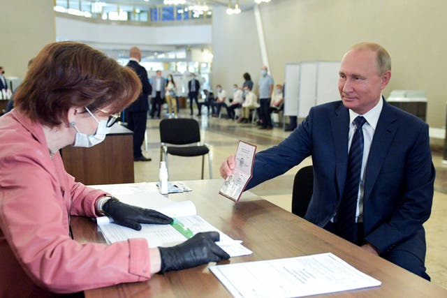Putin votes on the referendum allowing him to rule until 2036 at a polling station in Moscow