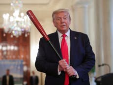 Trump plays golf even as coronavirus cases again hit record high